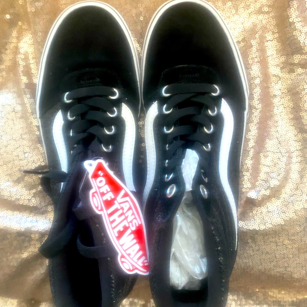Brand new VANS, never worn, tags on, black and white, comfortable.